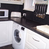 Kitchen with washing machine